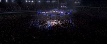 Movie still from “Creed” (2015), directed by Ryan Coogler – A boxing ring filled with people in the middle of a boxing ring; Extreme Wide shot, High angle