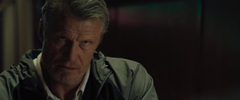 Movie still from “Creed II” (2018), directed by Steven Caple Jr. – A person wearing a jacket; Close Up shot, Low angle