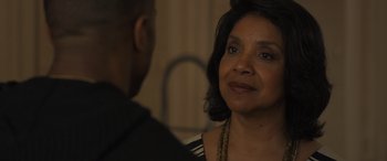 Movie still from “Creed II” (2018), directed by Steven Caple Jr. – An older black woman talking to a younger black man; Close Up shot, Over the shoulder angle