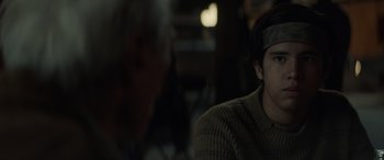 Movie still from “Cry Macho” (2021), directed by Clint Eastwood – A man sitting in front of a mirror in a dark room; Close Up shot, Over the shoulder angle