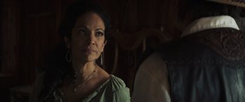 Movie still from “Cry Macho” (2021), directed by Clint Eastwood – A person wearing a green shirt; Close Up shot, Over the shoulder angle