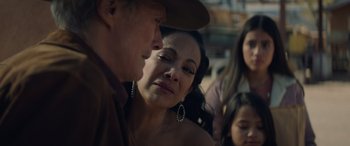 Movie still from “Cry Macho” (2021), directed by Clint Eastwood – A man and a woman looking at one another; Close Up shot, Over the shoulder angle