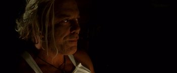 Movie still from “The Wrestler” (2008), directed by Darren Aronofsky – A person with long white hair; Close Up shot, Low angle