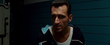 Movie still from “The Wrestler” (2008), directed by Darren Aronofsky – A person wearing a jacket; Close Up shot, Low angle