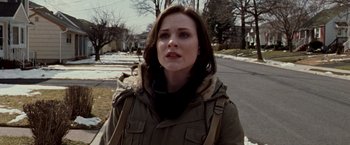 Movie still from “The Wrestler” (2008), directed by Darren Aronofsky – A woman standing on the side of a road in the snow; Close Up shot, Over the shoulder angle