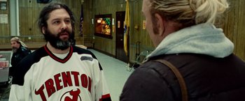 Movie still from “The Wrestler” (2008), directed by Darren Aronofsky – Two men are standing next to each other in a hallway; Close Up shot, Over the shoulder angle