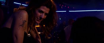 Movie still from “The Wrestler” (2008), directed by Darren Aronofsky – A person with long hair; Close Up shot, Over the shoulder angle