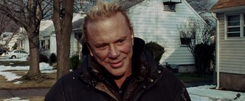 Movie still from “The Wrestler” (2008), directed by Darren Aronofsky – A person wearing a jacket; Close Up shot, Over the shoulder angle