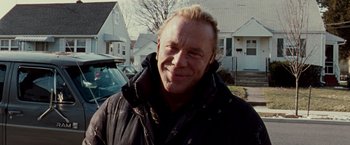Movie still from “The Wrestler” (2008), directed by Darren Aronofsky – A person wearing a jacket; Close Up shot, Over the shoulder angle