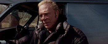 Movie still from “The Wrestler” (2008), directed by Darren Aronofsky – A person wearing a jacket; Close Up shot, Over the shoulder angle