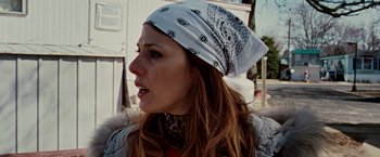 Movie still from “The Wrestler” (2008), directed by Darren Aronofsky – A person wearing a bandanna on their head; Close Up shot, Low angle