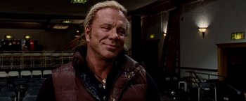 Movie still from “The Wrestler” (2008), directed by Darren Aronofsky – A person wearing a jacket; Close Up shot, Low angle