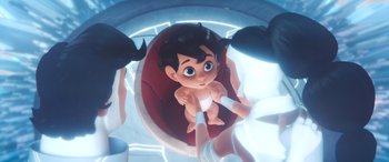 Movie still from “DC League of Super-Pets” (2022), directed by Jared Stern – An overhead view of an animated baby being held by two hands; Close Up shot, Overhead angle