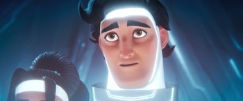 Movie still from “DC League of Super-Pets” (2022), directed by Jared Stern – A man's face with a glowing light around his head; Close Up shot, Low angle