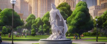 Movie still from “DC League of Super-Pets” (2022), directed by Jared Stern – A statue in the middle of a park; Wide shot, Low angle