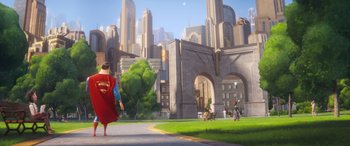 Movie still from “DC League of Super-Pets” (2022), directed by Jared Stern – An artist's rendering of a woman in a red dress walking down a sidewalk; Extreme Wide shot, Over the shoulder angle