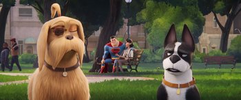 Movie still from “DC League of Super-Pets” (2022), directed by Jared Stern – A man and a woman sitting on a park bench; Close Up shot, Over the shoulder angle