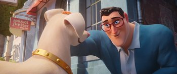 Movie still from “DC League of Super-Pets” (2022), directed by Jared Stern – A man and a white dog in a room; Close Up shot, Over the shoulder angle