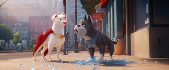 Movie still from “DC League of Super-Pets” (2022), directed by Jared Stern – A dog and a dog standing next to each other on a street; Wide shot, Low angle