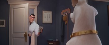 Movie still from “DC League of Super-Pets” (2022), directed by Jared Stern – A man and a dog are in a room; Medium shot, Over the shoulder angle