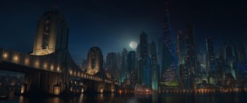 Movie still from “DC League of Super-Pets” (2022), directed by Jared Stern – A night view of a city with a full moon in the background; Extreme Wide shot, High angle