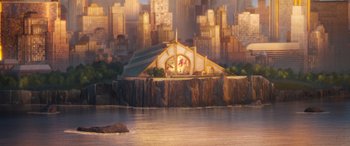 Movie still from “DC League of Super-Pets” (2022), directed by Jared Stern – An artistic rendering of an island with a clock on it; Extreme Wide shot, High angle