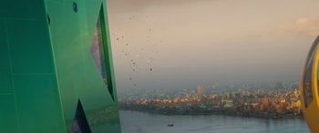 Movie still from “DC League of Super-Pets” (2022), directed by Jared Stern – A view of a city from a boat on the water; Extreme Wide shot, Low angle