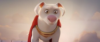 Movie still from “DC League of Super-Pets” (2022), directed by Jared Stern – An animated dog wearing a red cape and a gold collar; Close Up shot, High angle