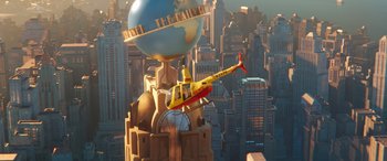 Movie still from “DC League of Super-Pets” (2022), directed by Jared Stern – A helicopter is flying over a building in a city; Extreme Wide shot, Low angle