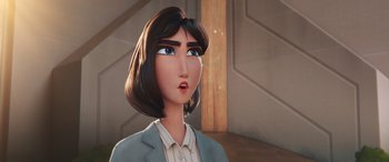 Movie still from “DC League of Super-Pets” (2022), directed by Jared Stern – An animated woman with short brown hair wearing a blue jacket; Close Up shot, Over the shoulder angle