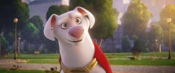 Movie still from “DC League of Super-Pets” (2022), directed by Jared Stern – A dog with a cape is smiling for the camera; Close Up shot, Over the shoulder angle