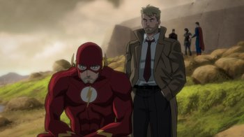 Movie still from “DC Showcase: Constantine - The House of Mystery” (2022), directed by Matt Peters – A man standing next to a man wearing a suit; Medium shot, Over the shoulder angle