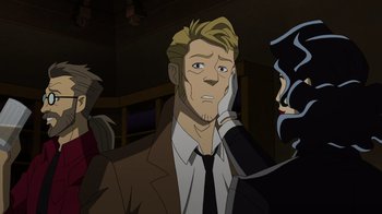 Movie still from “DC Showcase: Constantine - The House of Mystery” (2022), directed by Matt Peters – A man in a suit and tie looking at a woman in a suit and tie; Close Up shot, Over the shoulder angle