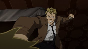 Movie still from “DC Showcase: Constantine - The House of Mystery” (2022), directed by Matt Peters – A man in a brown jacket and black tie; Medium shot, High angle