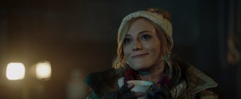 Movie still from “Dangerous” (2021), directed by David Hackl – A woman holding a cup in her hands; Close Up shot, Over the shoulder angle