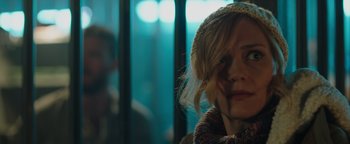 Movie still from “Dangerous” (2021), directed by David Hackl – A person wearing a hat; Close Up shot, Over the shoulder angle