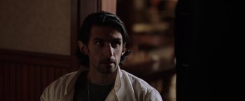 Movie still from “Dangerous” (2021), directed by David Hackl – A person with long hair; Close Up shot, Over the shoulder angle