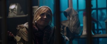 Movie still from “Dangerous” (2021), directed by David Hackl – A young girl with blonde hair wearing a knitted hat; Close Up shot, Over the shoulder angle