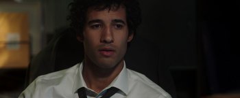 Movie still from “Dangerous” (2021), directed by David Hackl – A person wearing a shirt and tie; Close Up shot, Low angle