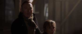 Movie still from “Dangerous” (2021), directed by David Hackl – A man and a woman standing next to each other; Close Up shot, Low angle