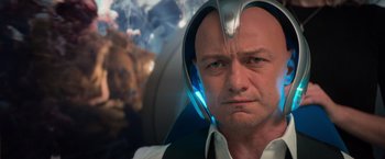 Movie still from “Dark Phoenix” (2019), directed by Simon Kinberg – A person wearing a helmet; Close Up shot, Over the shoulder angle