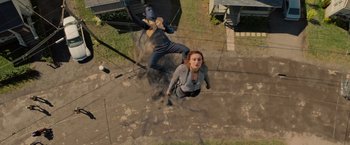 Movie still from “Dark Phoenix” (2019), directed by Simon Kinberg – A man and a woman are flying in the air; Wide shot, Overhead angle