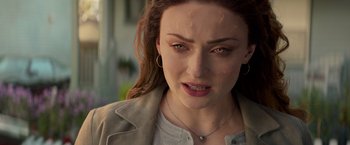 Movie still from “Dark Phoenix” (2019), directed by Simon Kinberg – A person wearing a jacket; Close Up shot, Over the shoulder angle