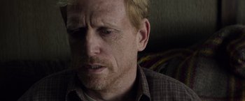 Movie still from “Dark Phoenix” (2019), directed by Simon Kinberg – A person with a beard; Close Up shot, High angle