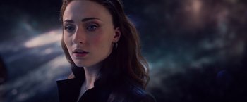 Movie still from “Dark Phoenix” (2019), directed by Simon Kinberg – A person wearing a jacket; Close Up shot, Over the shoulder angle