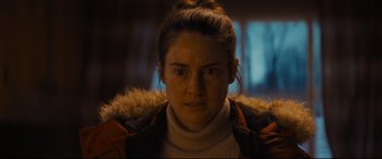 Movie still from “To Catch a Killer” (2023), directed by Damián Szifron – A person wearing a jacket; Close Up shot, Low angle