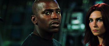 Movie still from “Dawn of the Dead” (2004), directed by Zack Snyder – A person looking at the camera; Close Up shot, Low angle