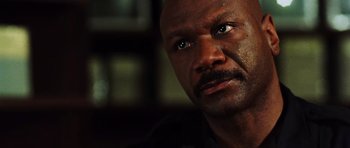 Movie still from “Dawn of the Dead” (2004), directed by Zack Snyder – A person looking at the camera; Close Up shot, Low angle