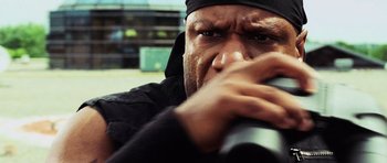 Movie still from “Dawn of the Dead” (2004), directed by Zack Snyder – A person holding a camera; Close Up shot, Low angle