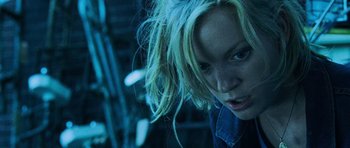 Movie still from “Dawn of the Dead” (2004), directed by Zack Snyder – A person with long blonde hair; Close Up shot, Low angle